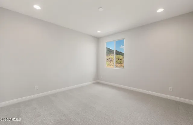 an empty room with a empty space and window