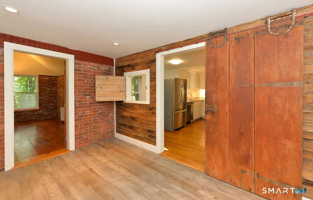 a view of entryway with wooden floor