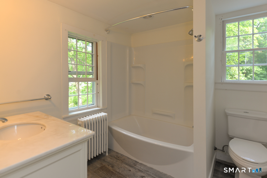 15 Hawkins Road Southbury, CT 06488 - Photo 19 of 26 a bathroom with a sink toilet and shower