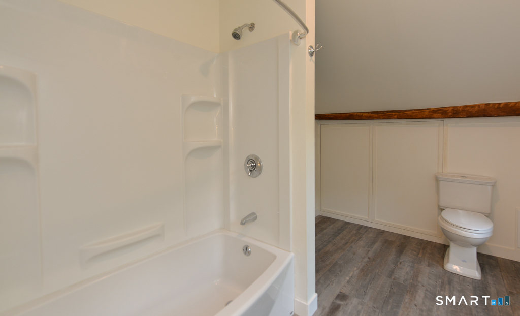 15 Hawkins Road Southbury, CT 06488 - Photo 26 of 26 a bathroom with a bathtub and a toilet