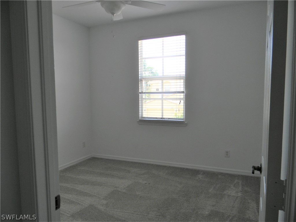 4109 Cherrybrook Loop Fort Myers, FL 33966 - Photo 21 of 32 an empty room with a window