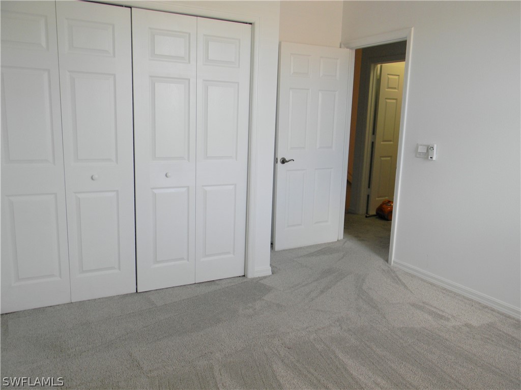 4109 Cherrybrook Loop Fort Myers, FL 33966 - Photo 23 of 32 an empty room with windows