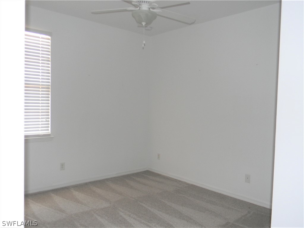 4109 Cherrybrook Loop Fort Myers, FL 33966 - Photo 24 of 32 an empty room with a window