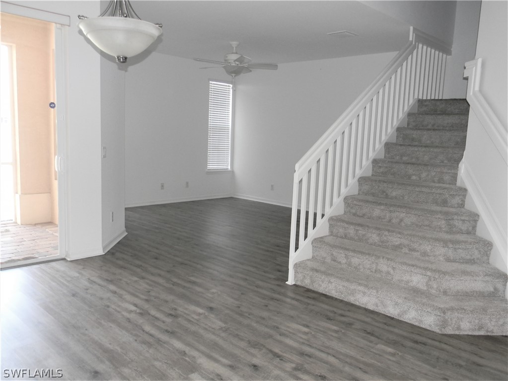 4109 Cherrybrook Loop Fort Myers, FL 33966 - Photo 4 of 32 a view of entryway and hall with wooden floor