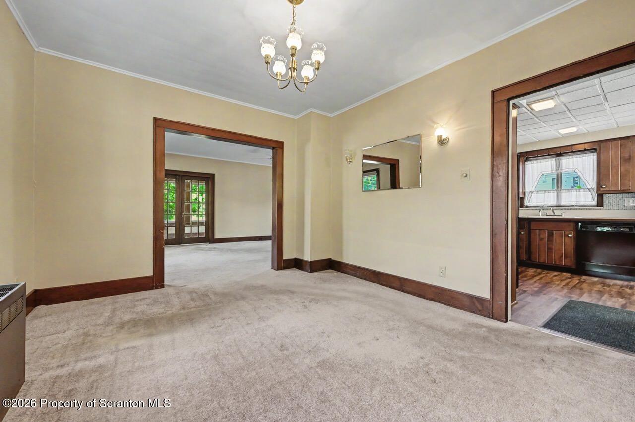 502 Layton Road Clarks Summit, PA 18411 - Photo 16 of 42 a view of a livingroom with a chandelier
