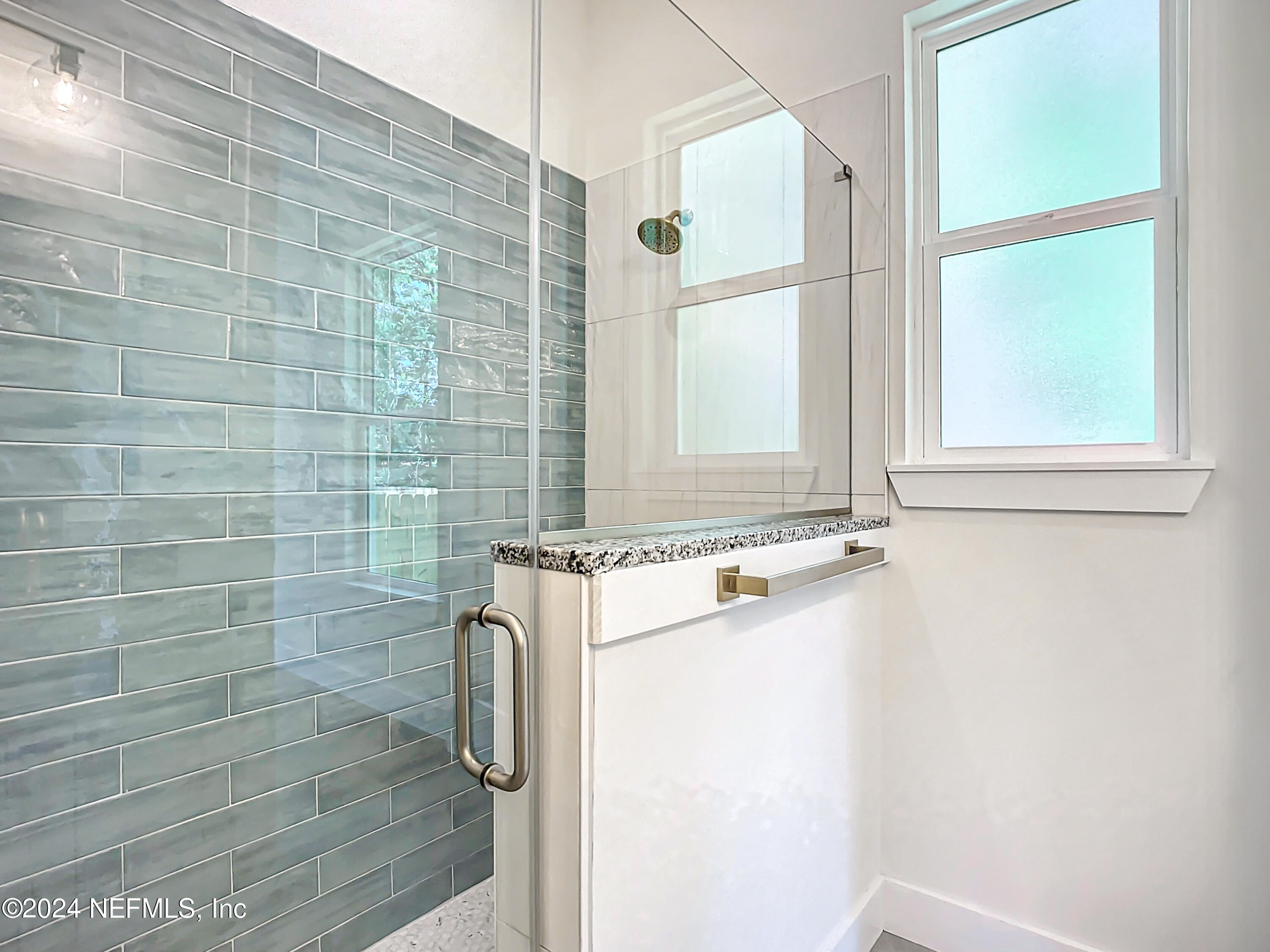 2903 Brougham Jacksonville, FL 32246 - Photo 23 of 40 a bathroom with a shower