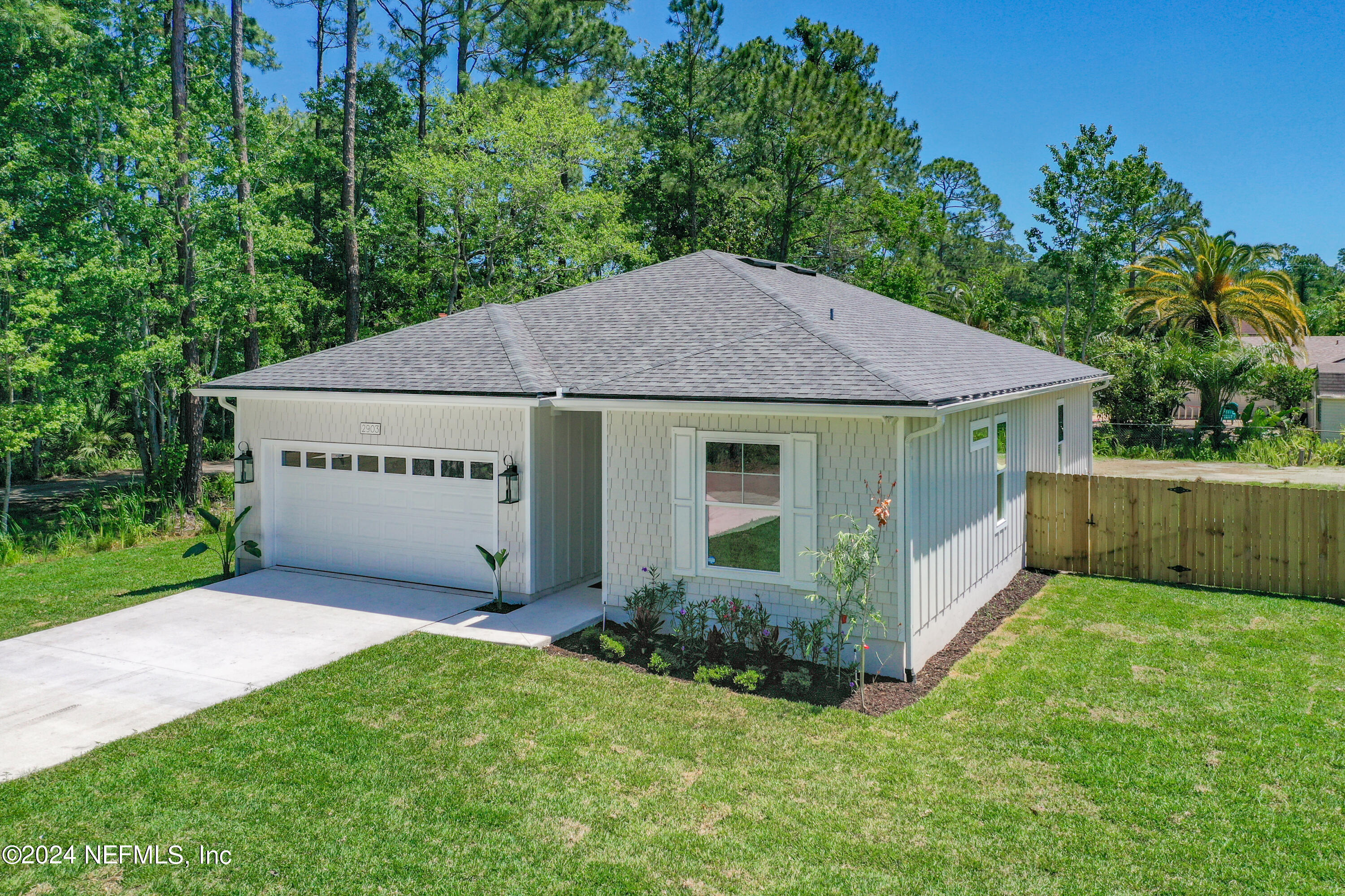 2903 Brougham Jacksonville, FL 32246 - Photo 3 of 40 a view of a house with backyard and garden
