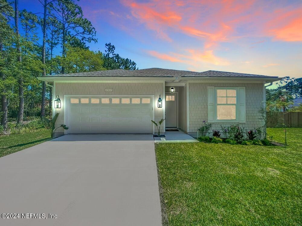 2903 Brougham Jacksonville, FL 32246 - Photo 40 of 40 a front view of a house with a yard and garage