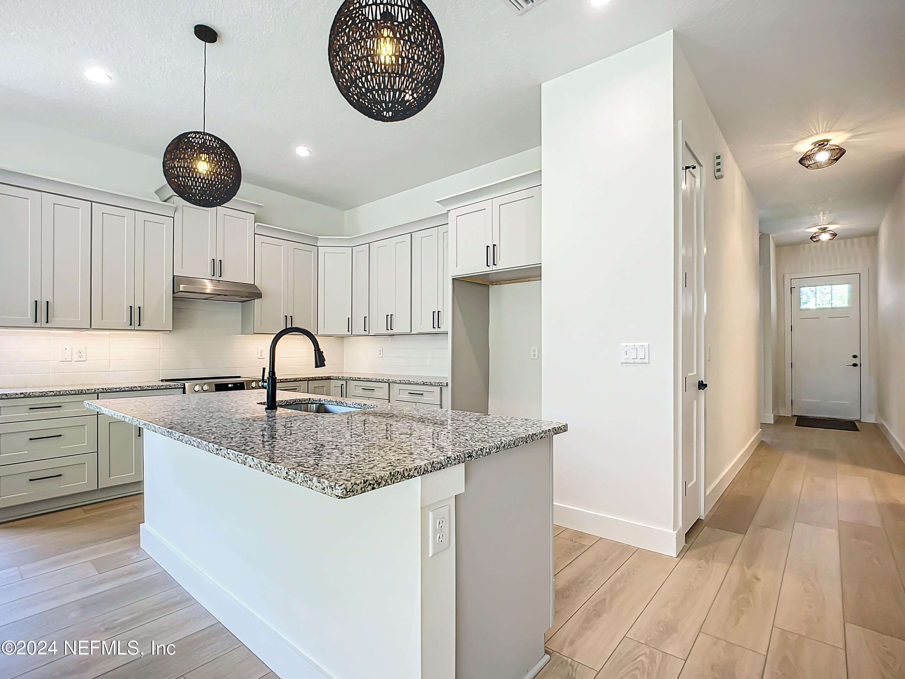 2903 Brougham Jacksonville, FL 32246 - Photo 9 of 40 a kitchen with a counter space cabinets and stainless steel appliances