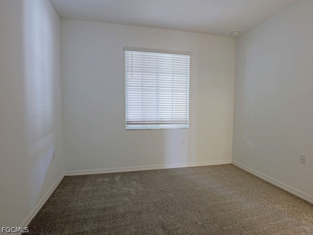 43997 Boardwalk Loop, Unit 1843 Punta Gorda, FL 33982 - Photo 6 of 11 an empty room with a window