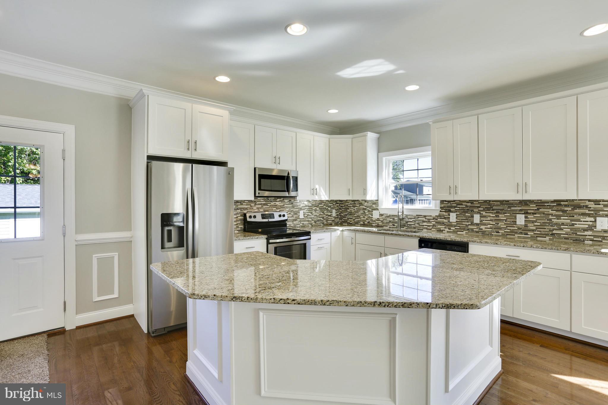 268 Arundel Road Pasadena, MD 21122 - Photo 4 of 30 Kitchen Features Granite and Stainless Appliances