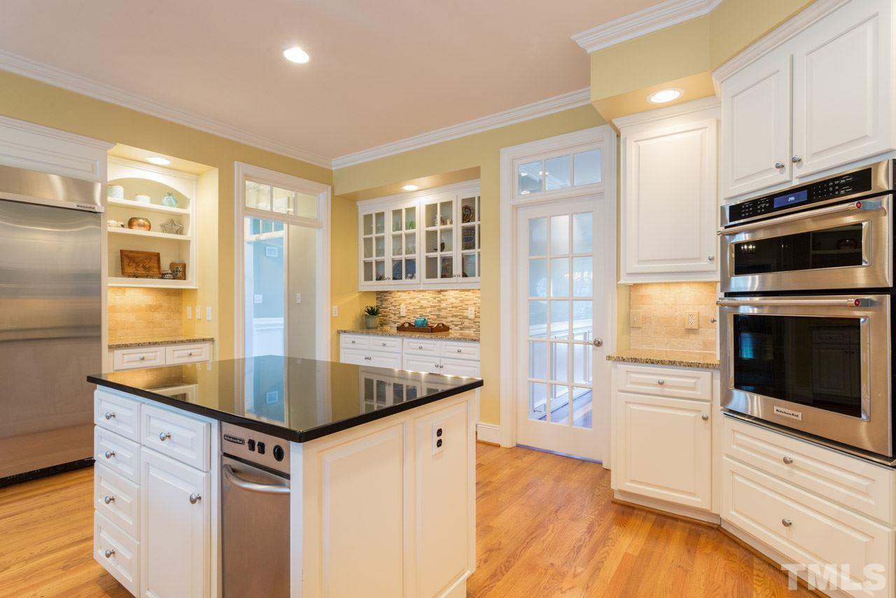 12528 Bayleaf Church Road Raleigh, NC 27614 - Photo 4 of 30 Built-in Refrigerator/Freezer, Gas Cook Top, 5- Burner Gas Range, Microwave and Wall Oven.