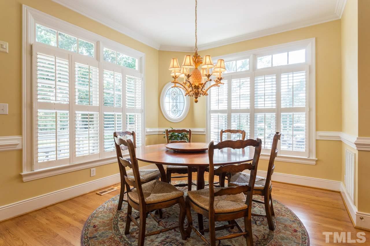 12528 Bayleaf Church Road Raleigh, NC 27614 - Photo 6 of 30 Open to Family Room, Plantation Shutters, Hardwood Floors, and Decorative Accent Window