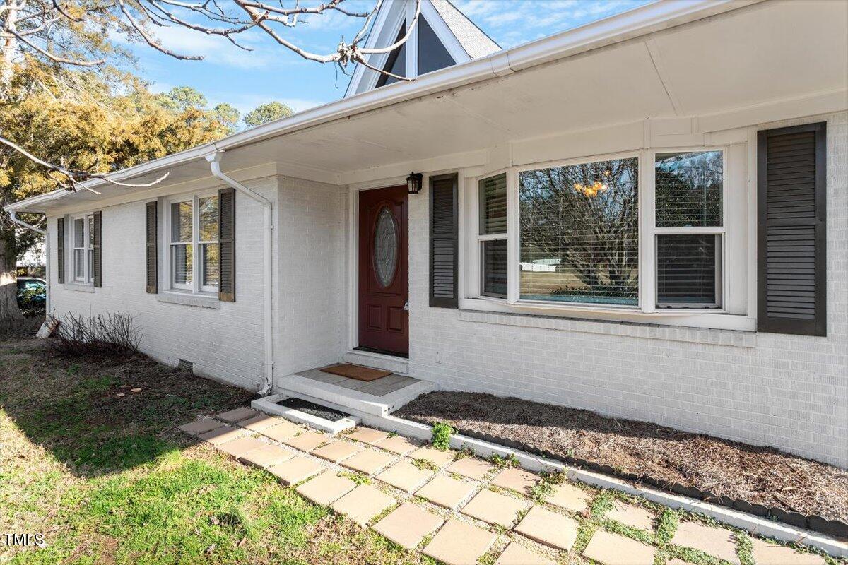 5707 Old Stage Road Raleigh, NC 27603 - Photo 1 of 50 a front view of a house