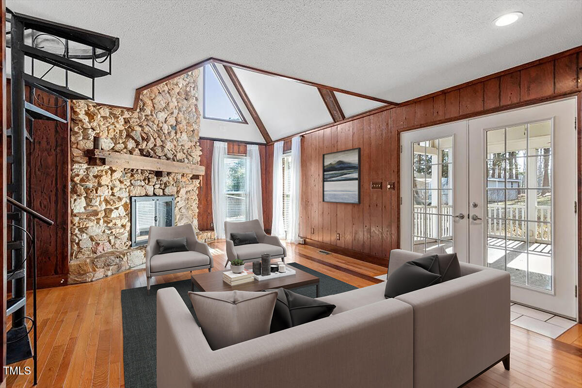 5707 Old Stage Road Raleigh, NC 27603 - Photo 12 of 50 a living room with furniture and a large window