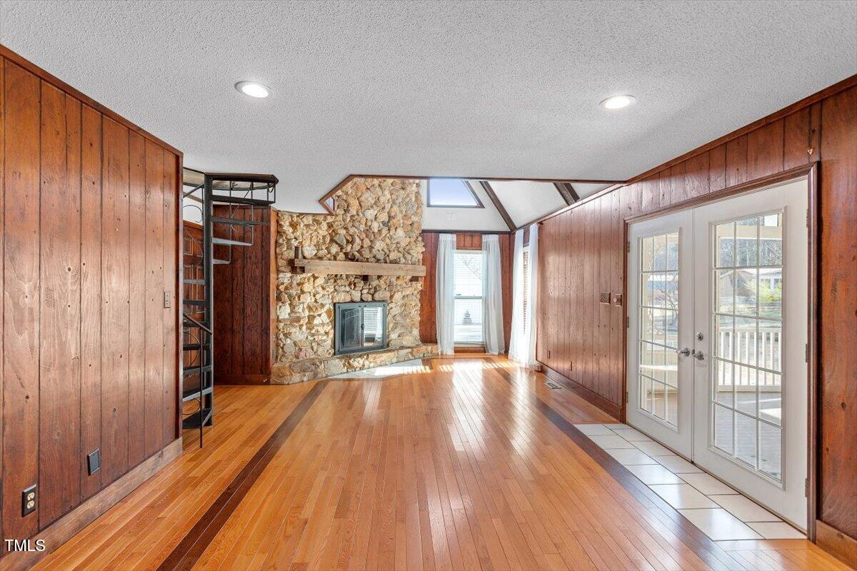 5707 Old Stage Road Raleigh, NC 27603 - Photo 25 of 50 a view of an empty room with a fireplace and a window
