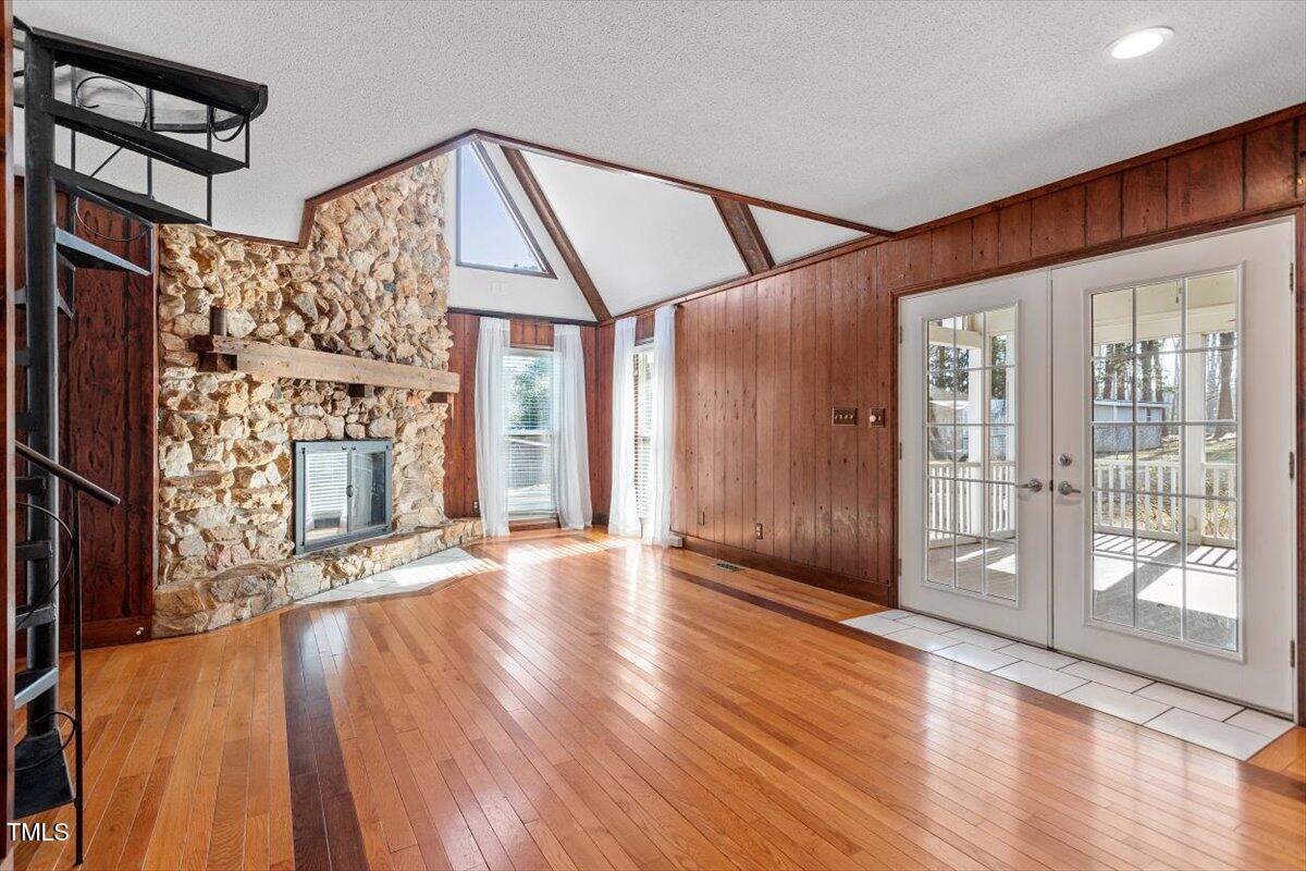 5707 Old Stage Road Raleigh, NC 27603 - Photo 27 of 50 a view of an empty room with wooden floor and a window