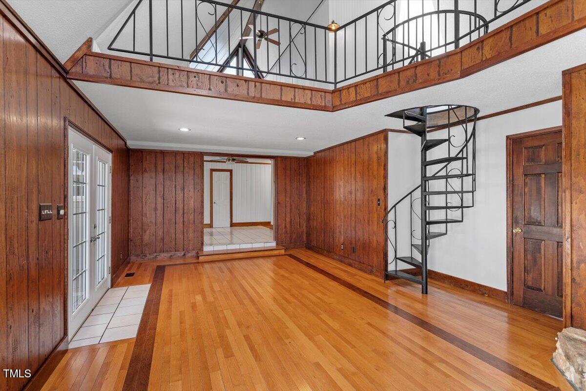 5707 Old Stage Road Raleigh, NC 27603 - Photo 29 of 50 a view of an entryway with wooden floor and staircase