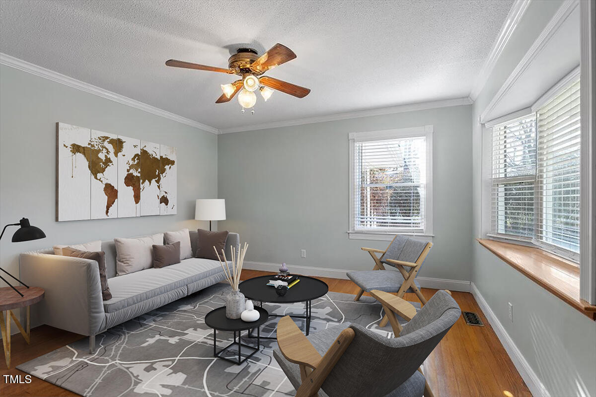 5707 Old Stage Road Raleigh, NC 27603 - Photo 2 of 50 a living room with furniture and a large window