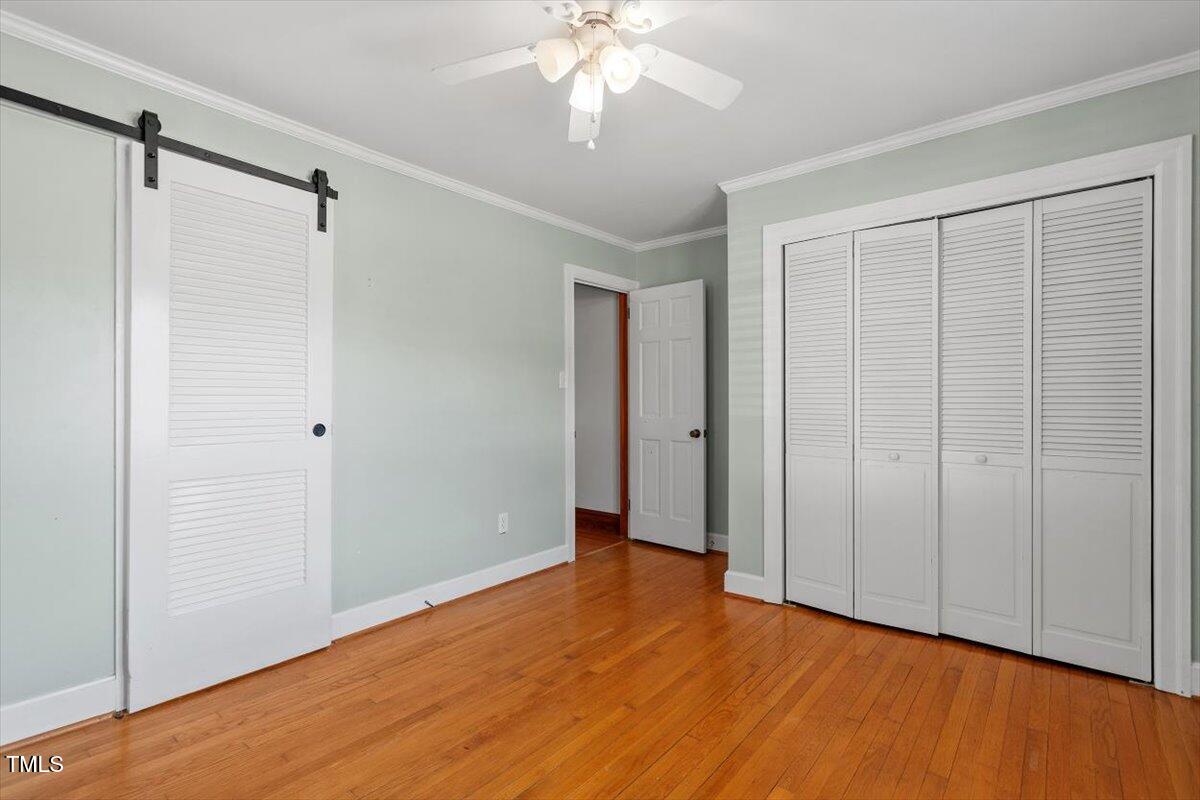 5707 Old Stage Road Raleigh, NC 27603 - Photo 31 of 50 a view of an empty room with wooden floor
