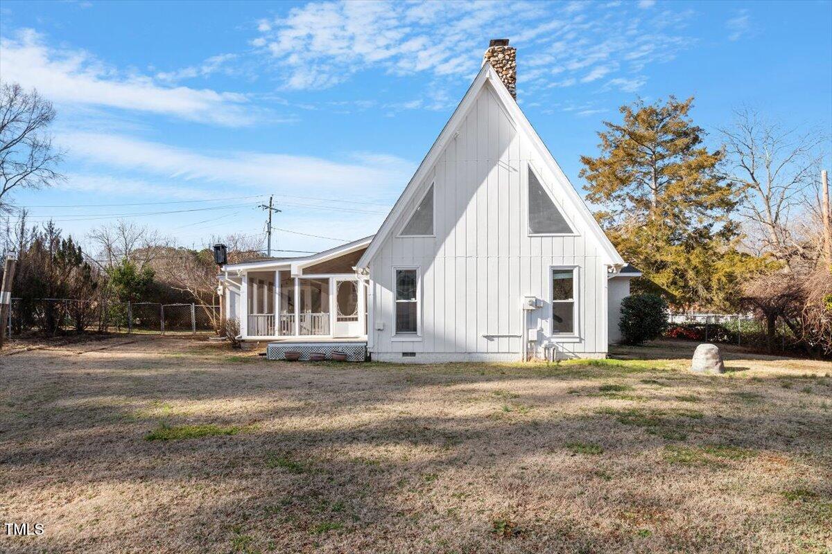 5707 Old Stage Road Raleigh, NC 27603 - Photo 39 of 50 a view of a house with a yard