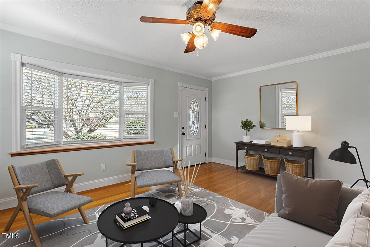 5707 Old Stage Road Raleigh, NC 27603 - Photo 3 of 50 a living room with furniture and a window