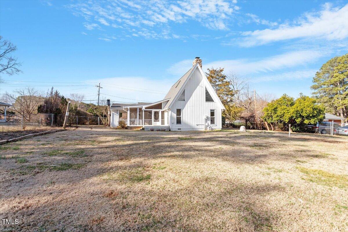 5707 Old Stage Road Raleigh, NC 27603 - Photo 40 of 50 a view of white house with a yard