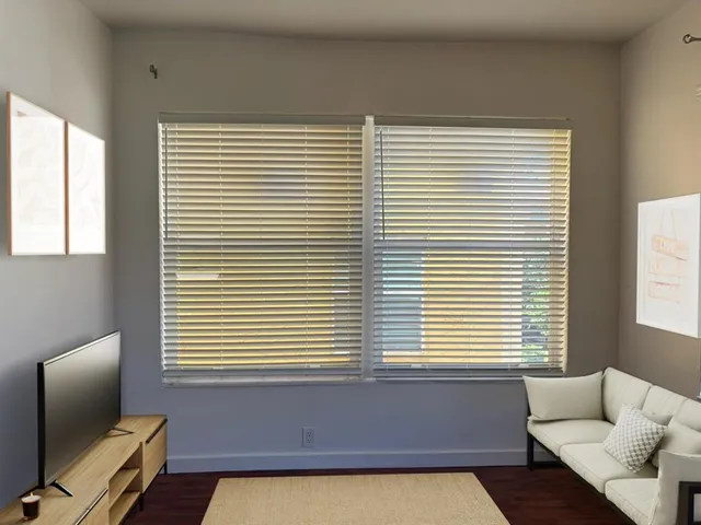 a view of a livingroom and a window