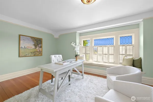 a living room with furniture and a window