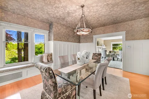 a view of a dining room with furniture window and outside view