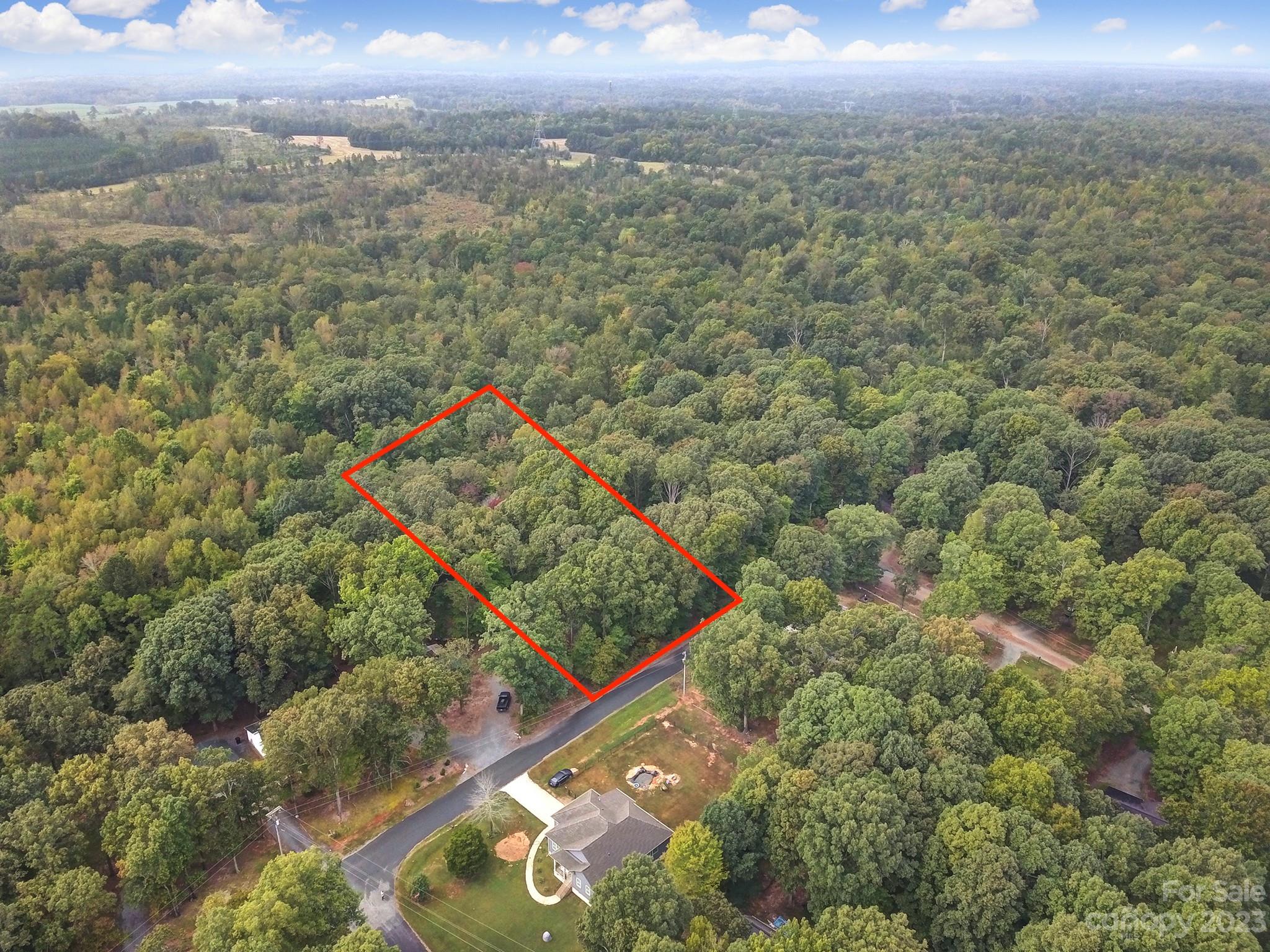 0 Crestview Road, Unit 137 Waxhaw, NC 28173 - Photo 2 of 3 an aerial view of a residential houses with city and green space