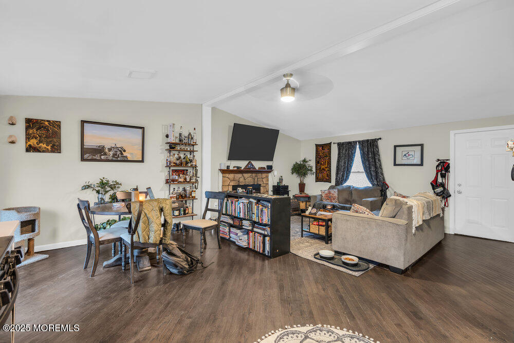 6 Mizzen Way Waretown, NJ 08758 - Photo 6 of 12 a living room with furniture and a flat screen tv