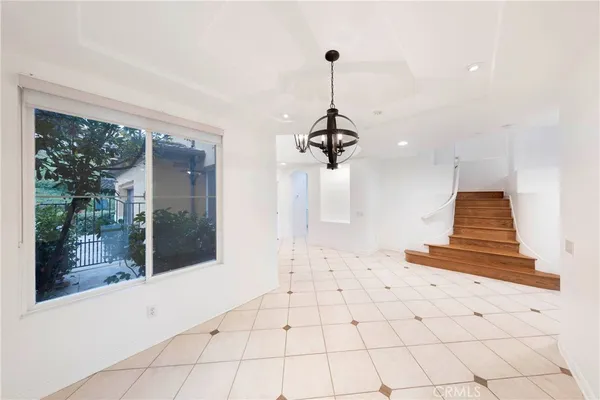 a view of empty room with windows