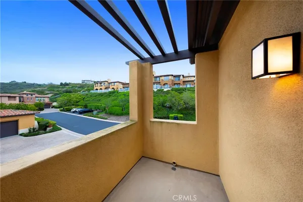 a view of a balcony with an outdoor space