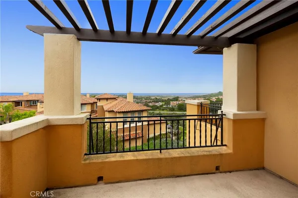 a view of a street from a balcony
