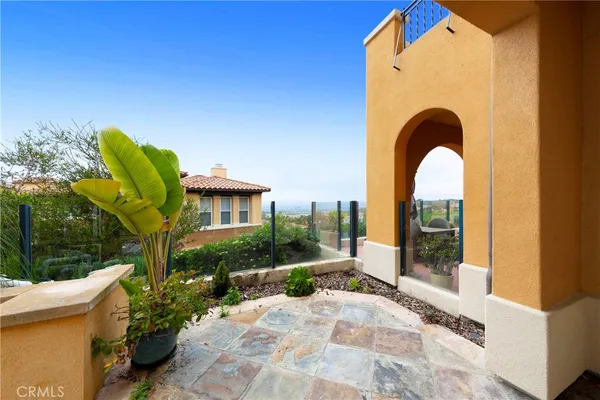 a view of a building with a potted plant