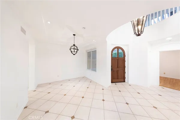 a view of empty room with windows