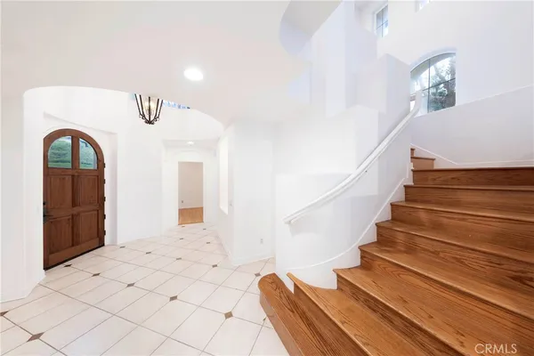 a view of entryway with stairs