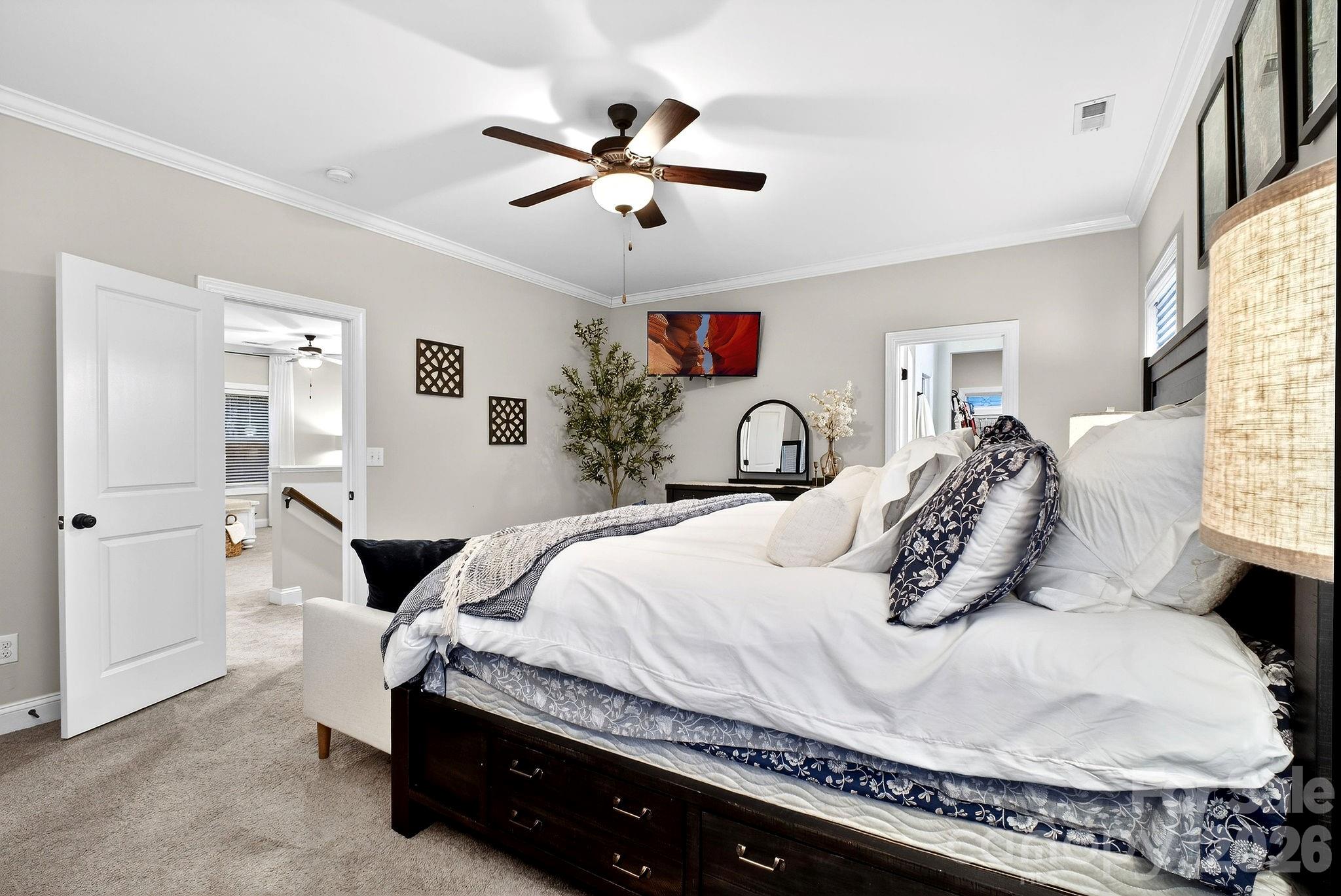 9092 Pitcairn Drive Fort Mill, SC 29708 - Photo 22 of 47 a bedroom with a bed and window