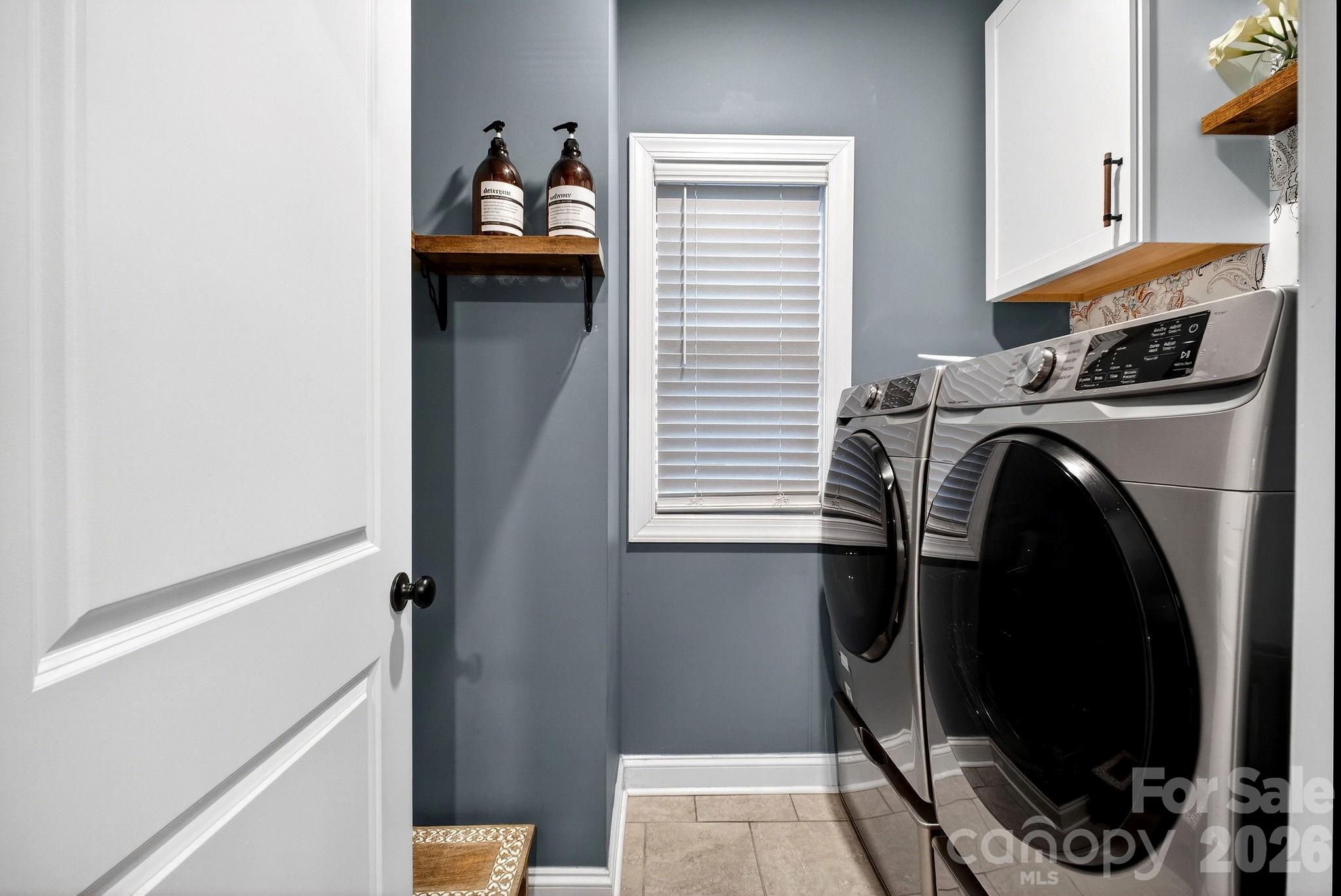 9092 Pitcairn Drive Fort Mill, SC 29708 - Photo 27 of 47 a utility room with dryer and washer