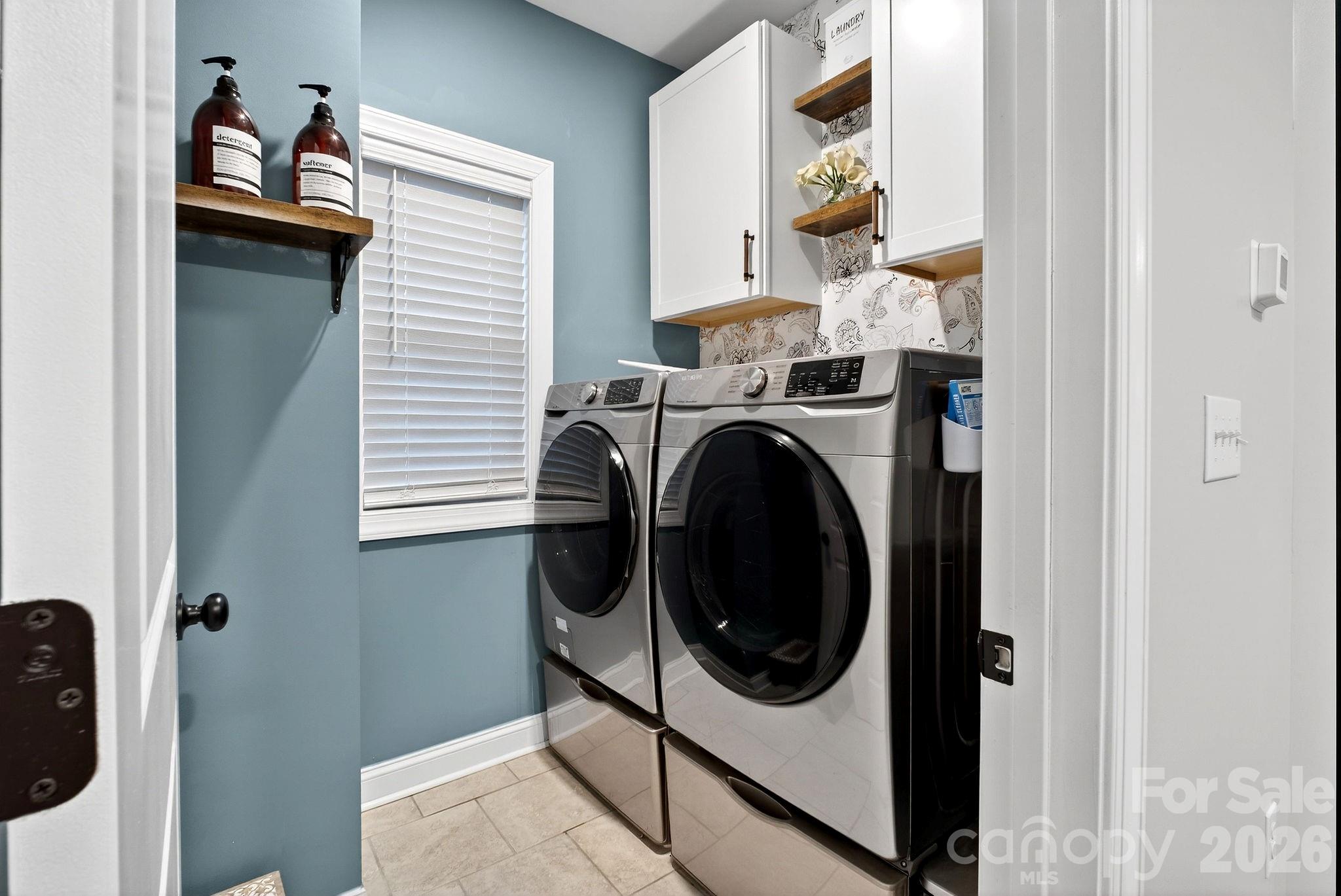 9092 Pitcairn Drive Fort Mill, SC 29708 - Photo 28 of 47 a utility room with dryer and washer