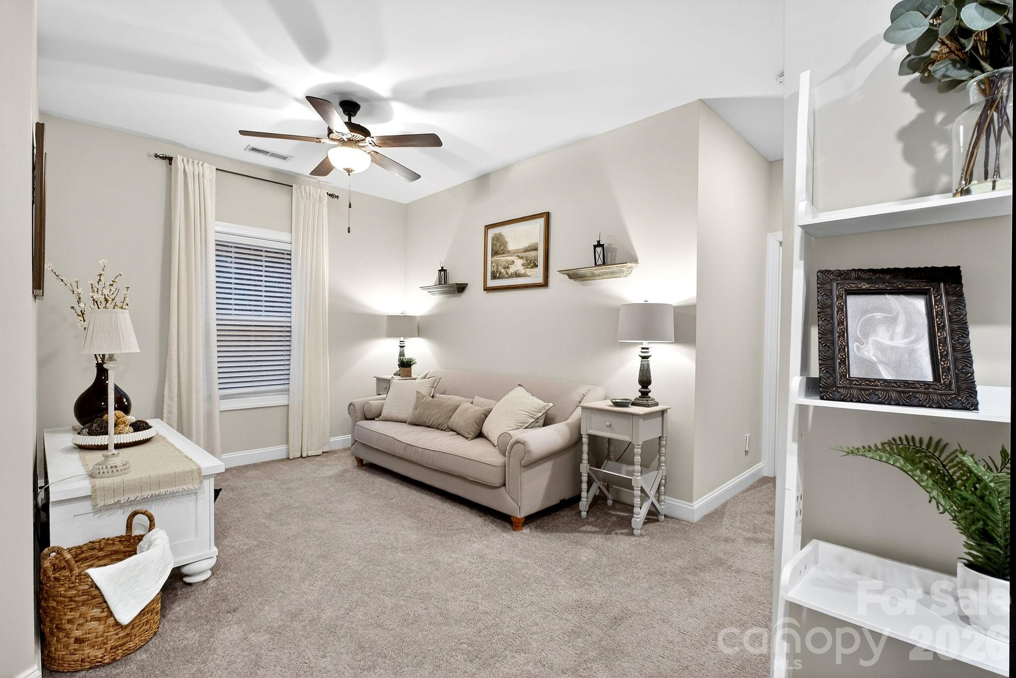 9092 Pitcairn Drive Fort Mill, SC 29708 - Photo 29 of 47 a living room with furniture and a window