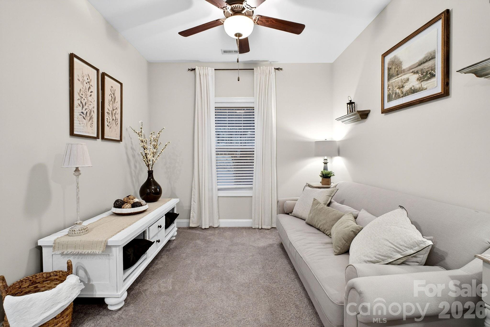 9092 Pitcairn Drive Fort Mill, SC 29708 - Photo 30 of 47 a living room with furniture and a window