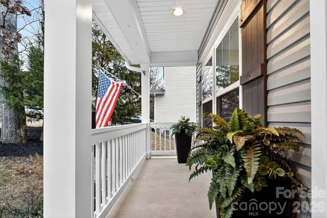 a view of a house with a flower garden