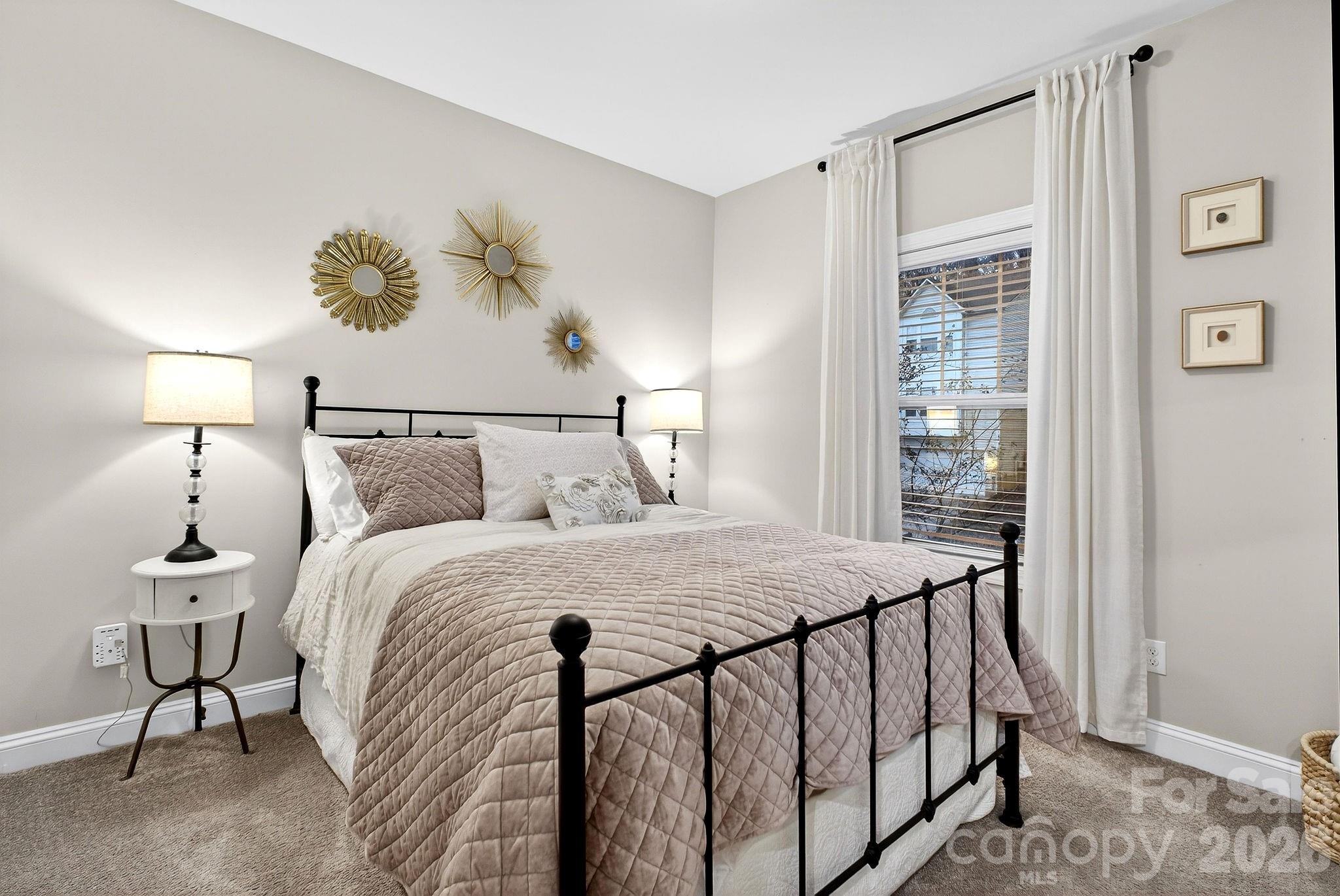 9092 Pitcairn Drive Fort Mill, SC 29708 - Photo 31 of 47 a bedroom with a bed and a window