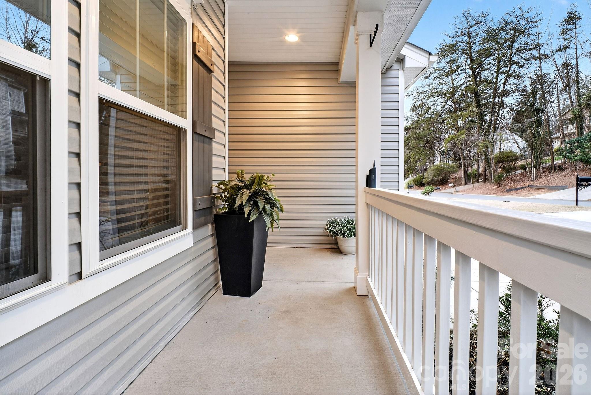 9092 Pitcairn Drive Fort Mill, SC 29708 - Photo 4 of 47 a view of a balcony with potted plants