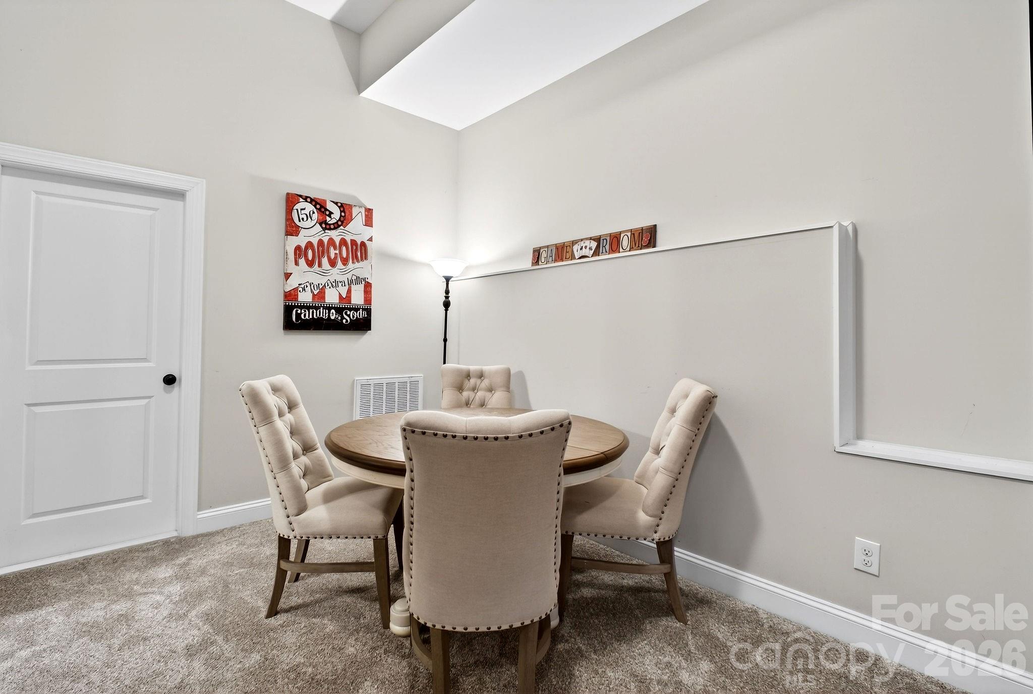 9092 Pitcairn Drive Fort Mill, SC 29708 - Photo 44 of 47 a view of a dining room with furniture and wooden floor
