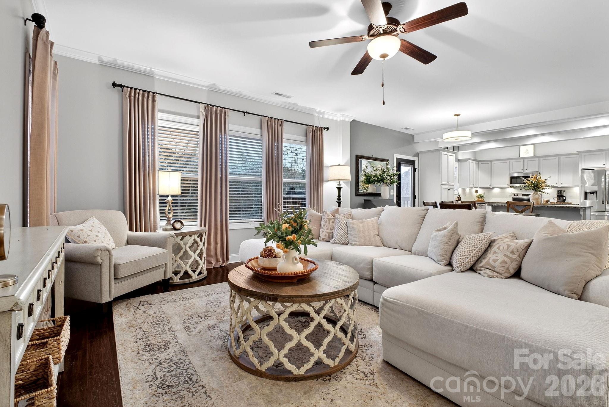 9092 Pitcairn Drive Fort Mill, SC 29708 - Photo 9 of 47 a living room with furniture and a large window