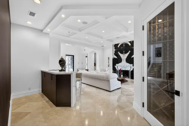 a bathroom with a toilet sink and shower curtain