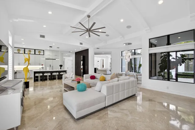 a bathroom with a toilet a sink a mirror a bathtub and shower